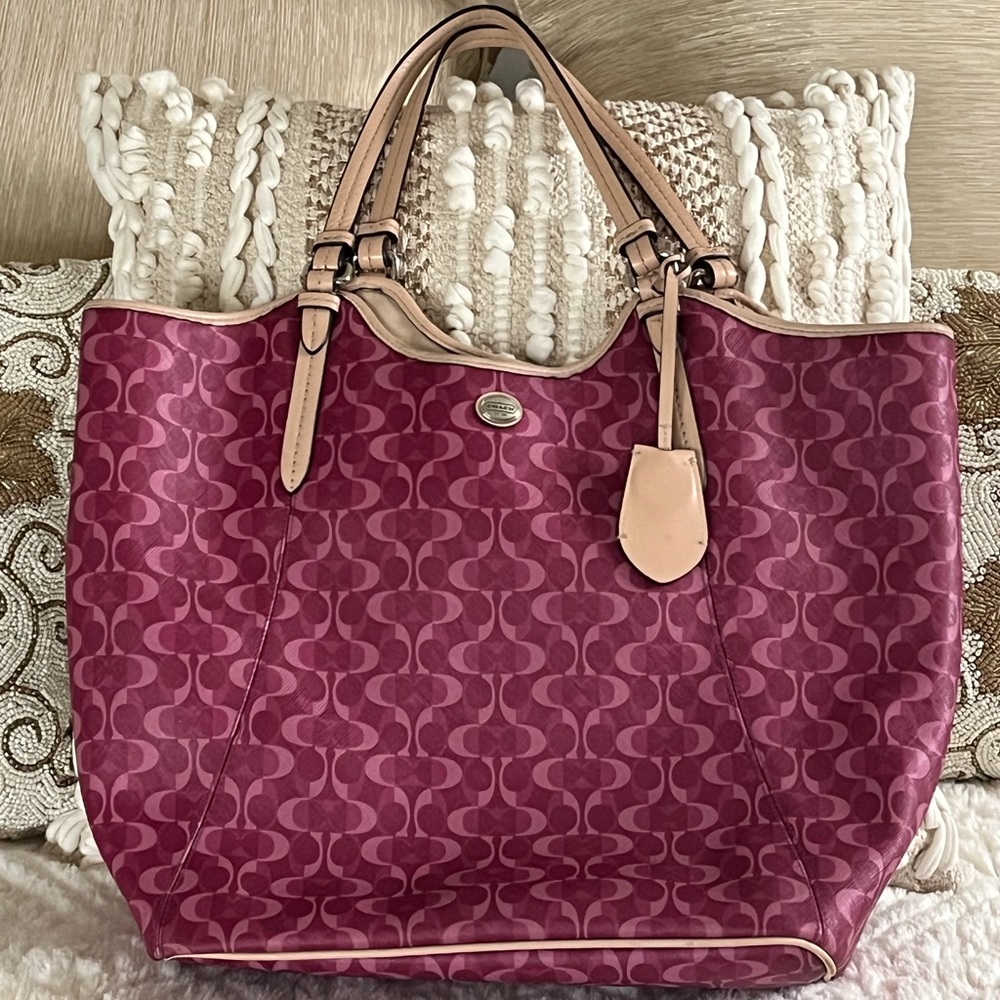 Pink and tan Coach purse.